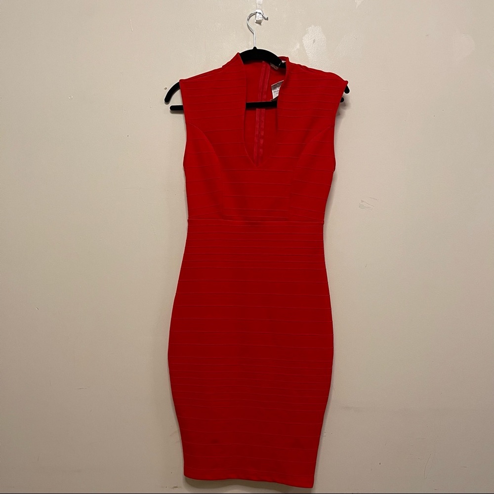 Body con mid low cut dress.
